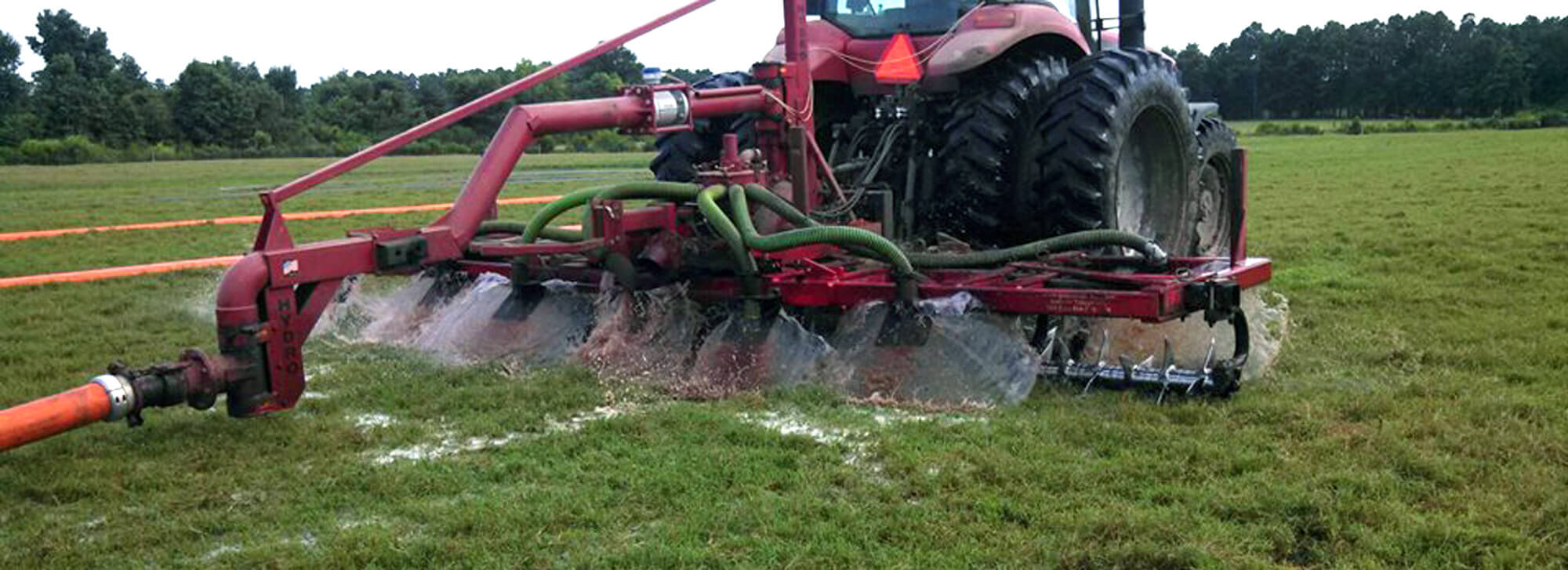 Direct manure injectors behind a large tractor